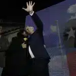 José Antonio Kast waves to the camera. Photo: AP Photo/Esteban Felix.