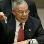 U.S. Secretary of State Colin Powell holds up a vial that he described as one that could contain anthrax, during his "presentation" on [Iraq] to the U.N. Security Council, in New York February 5, 2003. Photo: Ray Stubblebine/Reuters.