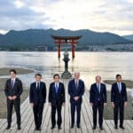 Joe Biden, Olaf Scholz, Rishi Sunak, Ursula von der Leyen, Charles Michel, Giorgia Meloni, Justin Trudeau, Emmanuel Macron and Fumio Kishida attend a photo session at Itsukushima Shrine during the G7 leaders' summit in Hatsukaichi, Hiroshima Prefecture, western Japan. Photo: Kenny Holston via Reuters.
