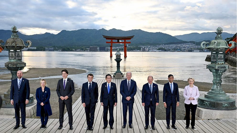Joe Biden, Olaf Scholz, Rishi Sunak, Ursula von der Leyen, Charles Michel, Giorgia Meloni, Justin Trudeau, Emmanuel Macron and Fumio Kishida attend a photo session at Itsukushima Shrine during the G7 leaders' summit in Hatsukaichi, Hiroshima Prefecture, western Japan. Photo: Kenny Holston via Reuters.