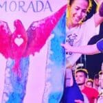 Fans raise a banner wtih the cover picture of the Cuban music duo Buena Fe's latest album Morada. Photo: Prensa Latina.