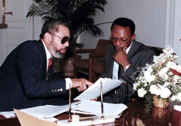 Ambassador at Large Ben Dupuy with President Jean-Bertrand Aristide in 1991. Photo: File photo.