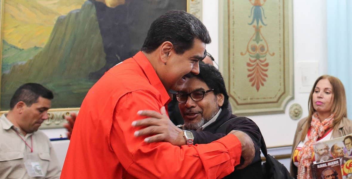 Venezuelan President Nicolás Maduro (left) greeting with a hug Venezuelan Communist Party's general secretary Óscar Figuera (right) at Miraflores Palace. Photo: Factores de Poder/File photo.