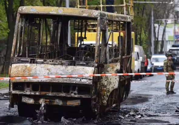 A passenger bus destroyed by Ukrainian shelling in Donetsk, Donetsk People's Republic, Russia. Photo: Sputnik/Taisija Voroncova.