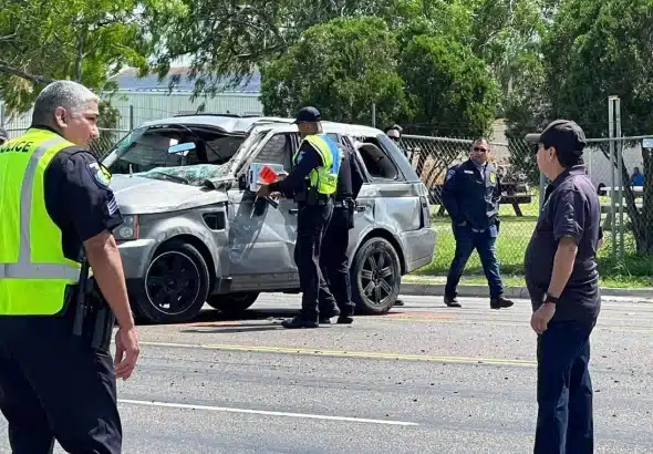 Police officers inspecting the SUV involved in a tragic incident resulting in the death of eight migrants in Brownsville, Texas, on Sunday, May 7. Photo: CNN.