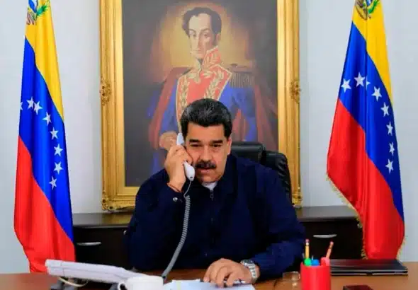Venezuelan President Nicolas Maduro talking on the telephone from his office in Miraflores Palace, Caracas. Photo: Presidential Press/File photo.