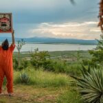Featured image: Shepard Fairey Sign at Guantánamo Bay. Photo: Justin Norman is licensed under CC BY-SA 2.0/Flickr.
