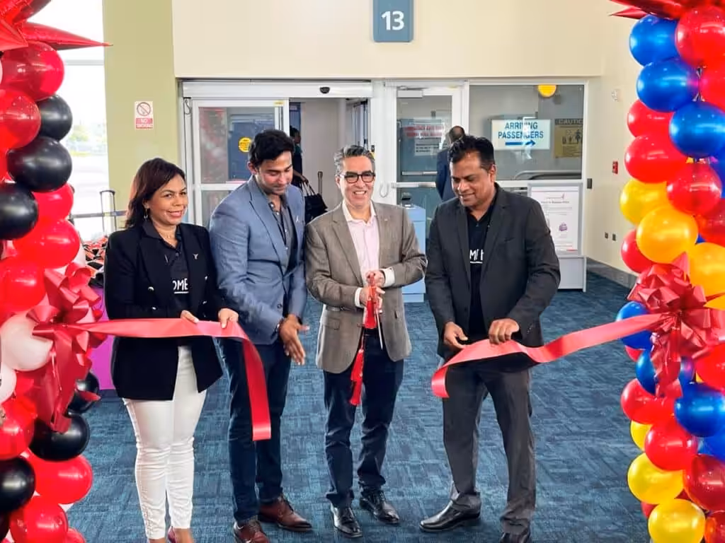 Trinidad & Tobago Minister Richie Sookhai and Venezuelan Ambassador to the island, Álvaro Sánchez Cordero, participate in the inaugural flight ceremony.