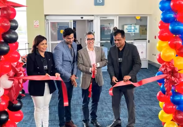 Trinidad & Tobago Minister Richie Sookhai and Venezuelan Ambassador to the island, Álvaro Sánchez Cordero, participate in the inaugural flight ceremony.