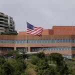 A US flag flying outside the US Embassy in Caracas, Venezuela, in January 2019, weeks before the breaking of diplomatic relations between the countries after the launched the failed US "regime change" operation to oust President Nicolás Maduro. Photo: Fernando Llano/AP/File photo.