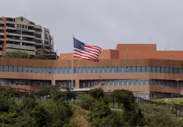 A US flag flying outside the US Embassy in Caracas, Venezuela, in January 2019, weeks before the breaking of diplomatic relations between the countries after the launched the failed US "regime change" operation to oust President Nicolás Maduro. Photo: Fernando Llano/AP/File photo.