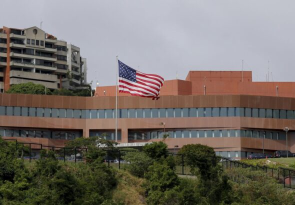 A US flag flying outside the US Embassy in Caracas, Venezuela, in January 2019, weeks before the breaking of diplomatic relations between both countries after the launching of the failed US "regime change" operation to oust President Nicolás Maduro. Photo: Fernando Llano/AP/File photo.