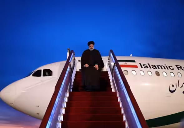Iranian President Seyed Ebrahim Raisi exiting the presidential plane. Photo: Irangov.ir/File photo.