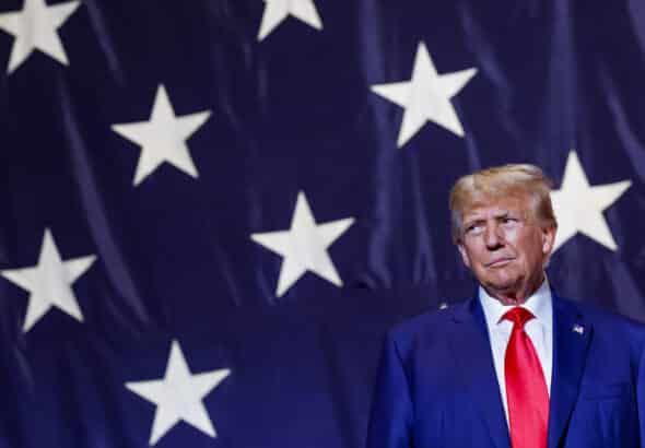 Former President Donald Trump in front of the stars of a US flag during a political rally in Columbus, Georgia, on June 10. Photo: Anna Moneymaker/Getty Images.
