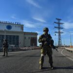 Russian soldiers patrol at the Kakhovka Hydroelectric Power Plant, Kherson, Russia, on May 20, 2022. Photo: AFP/File photo.