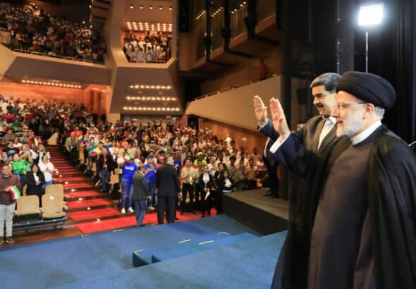 Iranian President Ebrahim Raisi (right) next to Venezuelan President Nicolas Maduro (left) greeting attendees at a youth forum held at the Teresa Carreno Theater in Caracas on Tuesday, June 13, 2023. Photo: Twitter/@NicolasMaduro.