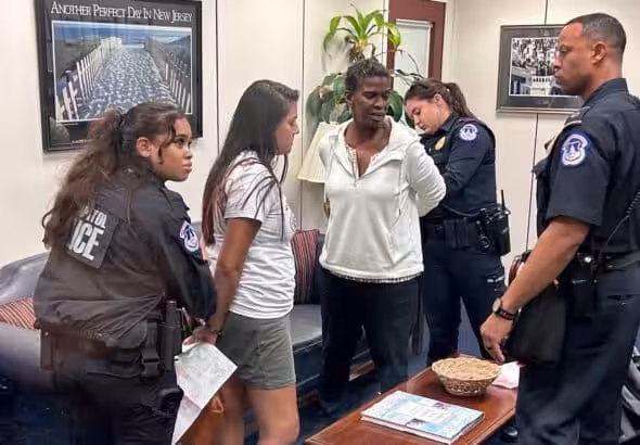 Cuba solidarity activists are arrested inside Senator Bob Menéndez's office in Washington, DC, June 22, 2023. Photo: Bill Hackwell.
