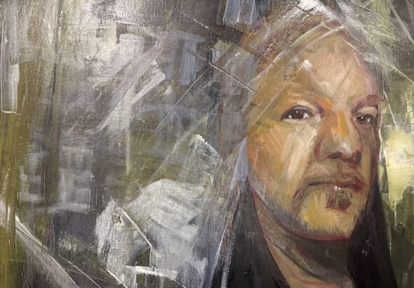 Julian Assange painted on a canvas. Photo: caitlinjohnstone.com/File Photo.