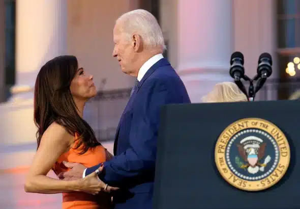 US President Joe Biden with his hand too close to Eva Longoria's breast during an event in the White House on Friday, June 16 2023. Photo: Shutterstock.