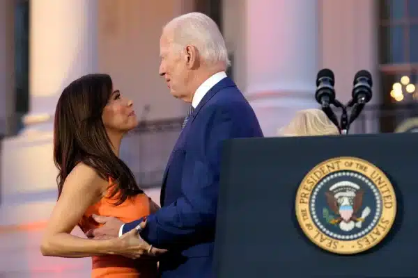 US President Joe Biden with his hand too close to Eva Longoria's breast during an event in the White House on Friday, June 16 2023. Photo: Shutterstock.