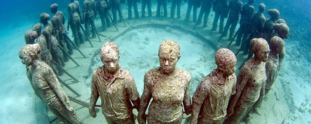 An eerie ring of statues in Grenada’s Molinere Underwater Sculpture Park. Photo: Orlando K. Romain.