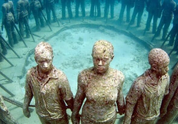 An eerie ring of statues in Grenada’s Molinere Underwater Sculpture Park. Photo: Orlando K. Romain.