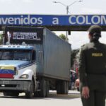 A merchandise truck crosses the Simón Bolívar bridge from Colombia to Venezuela during the border reopening ceremony on September 26, 2022. Photo: EFE/Carlos Ortega.