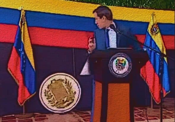 Stylized screenshot of an awkward moment during Juan Guaidó's so-called "interim presidency," when an improvised Venezuelan coat of arms fell while in the middle of one of his unintelligible speeches. Photo: Venezuelanalysis.com/File photo.