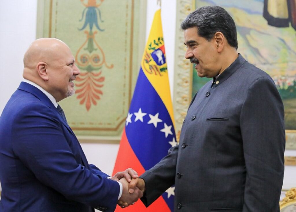 ICC Prosecutor Karim Khan (left) and Venezuelan President Nicolás Maduro (right) shake hands in Miraflores Palace, Caracas. Photo: Presidential Press.