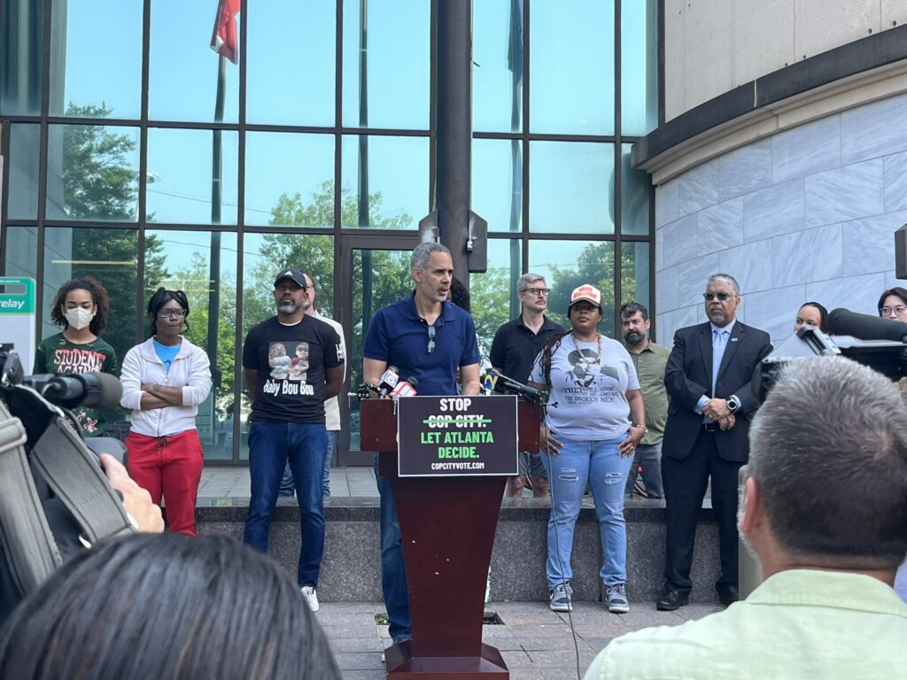 Kamau Franklin of Community Movement Builders and other organizers announce a ballot referendum effort at a June 7 press conference in Atlanta. Photo: Twitter @Micahinatl.