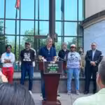 Kamau Franklin of Community Movement Builders and other organizers announce a ballot referendum effort at a June 7 press conference in Atlanta. Photo: Twitter @Micahinatl.