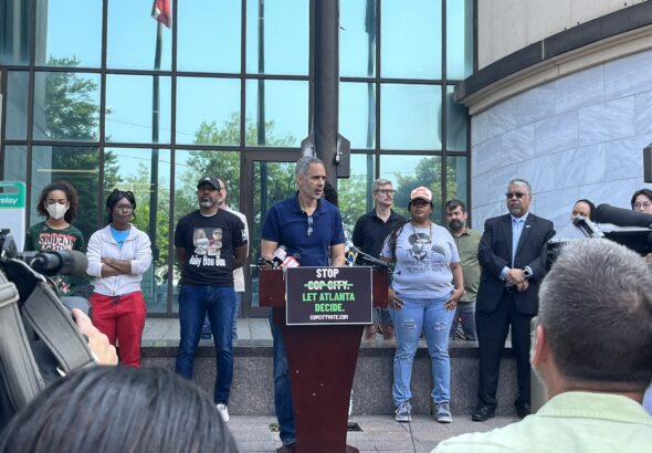 Kamau Franklin of Community Movement Builders and other organizers announce a ballot referendum effort at a June 7 press conference in Atlanta. Photo: Twitter @Micahinatl.