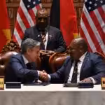 Officials from the US and Papua New Guinea sign a cooperation agreement. Photo: Misión Verdad.