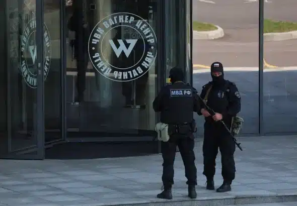 Russian law enforcement officers stand guard outside PMC Wagner Center in Saint Petersburg, Russia, on June 24, 2023. Photo: Reuters.