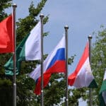 Flags flutter at the headquarters of the Shanghai Cooperation Organisation in Beijing on July 4, 2023. Photo: PressTV.