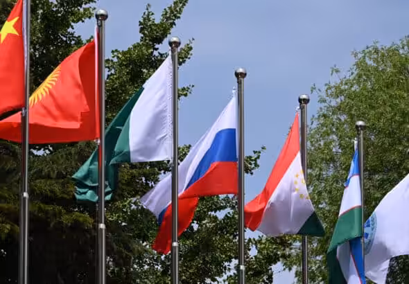 Flags flutter at the headquarters of the Shanghai Cooperation Organisation in Beijing on July 4, 2023. Photo: PressTV.
