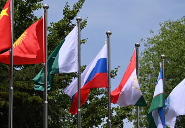 Flags flutter at the headquarters of the Shanghai Cooperation Organisation in Beijing on July 4, 2023. Photo: PressTV.