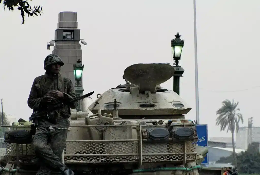 An Egyptian soldier stands atop a tank in Tahrir. Photo: Wikimedia Commons.