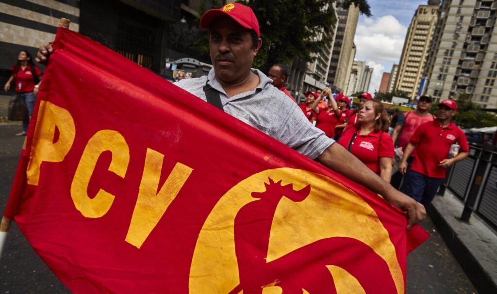 Communist Party of Venezuela (PCV) supporter marching at a government demonstration in support of the Bolivarian Revolution a few years ago. Photo: Cristian Hernandez/Cronica Uno/FIle photo.