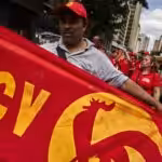 Communist Party of Venezuela (PCV) supporter marching at a government demonstration in support of the Bolivarian Revolution a few years ago. Photo: Cristian Hernandez/Cronica Uno/FIle photo.