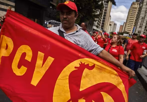 Communist Party of Venezuela (PCV) supporter marching at a government demonstration in support of the Bolivarian Revolution a few years ago. Photo: Cristian Hernandez/Cronica Uno/FIle photo.