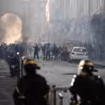Protesters clash with riot police at the Porte d'Aix in Marseille, southern France, on June 30, 2023, over the murder of an adolescent by French police in a Paris suburb on June 27. Photo: Christophe Simon/AFP.