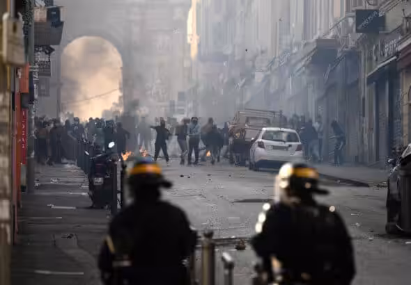 Protesters clash with riot police at the Porte d'Aix in Marseille, southern France, on June 30, 2023, over the murder of an adolescent by French police in a Paris suburb on June 27. Photo: Christophe Simon/AFP.