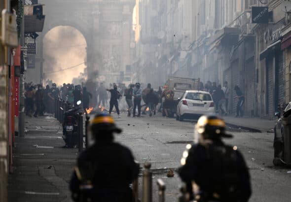 Protesters clash with riot police at the Porte d'Aix in Marseille, southern France, on June 30, 2023, over the murder of an adolescent by French police in a Paris suburb on June 27. Photo: Christophe Simon/AFP.