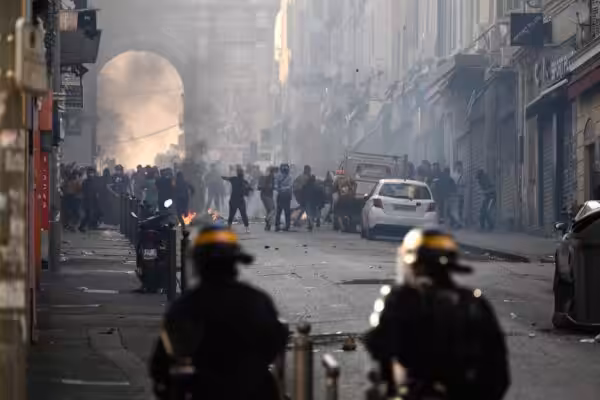 Protesters clash with riot police at the Porte d'Aix in Marseille, southern France, on June 30, 2023, over the murder of an adolescent by French police in a Paris suburb on June 27. Photo: Christophe Simon/AFP.