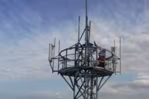 Equipment being installed atop a 5G base station in northwest China’s Xinjiang region. Photo: Xinhua