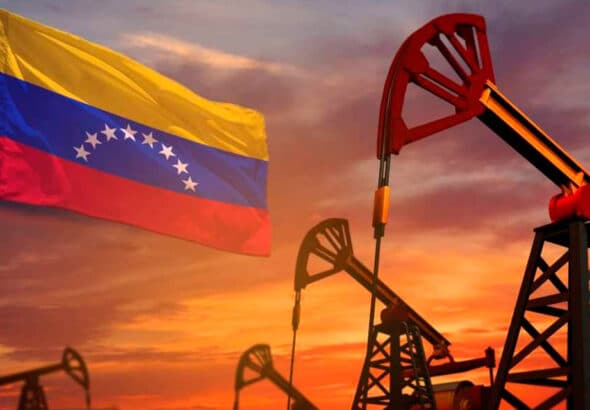 Photo composition showing oil rigs next to a Venezuelan flag. Photo: Shutterstock/Anton_Medvedev.