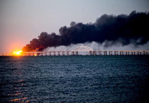 Kerch Bridge on fire after Ukrainian explosive attack. Photo: Vera Katkova/Anadolu Agency.