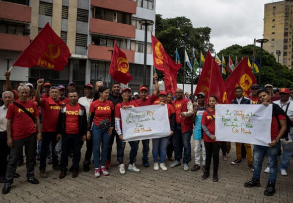 Members of the Communist Party of Venezuela demonstrate outside the Supreme Court of Justice in Caracas, July 10, 2023. Photo: Miguel Gutiérrez/EFE.
