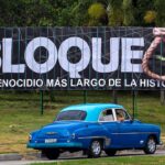 A billboard on a Havana highway denounces 60 years of the criminal US  blockade with the following caption next to a hanging rope: "blockade: the longest genocide in history." Photo: AP/File photo.